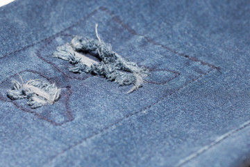 jean on wooden desk make pattern background,line of jean ,bag of jean,font and back of jean on wooden desk
