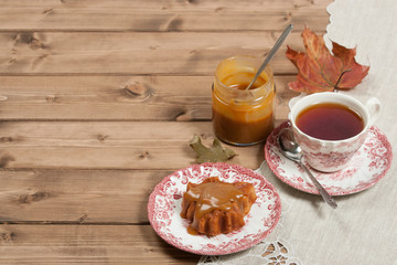 Homebaked Cake, Maple Leaf Shape. Cup Of Tea. Toffee Souce. Top