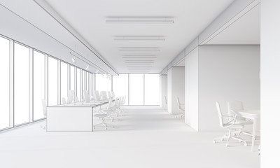 White office with large tables and computers