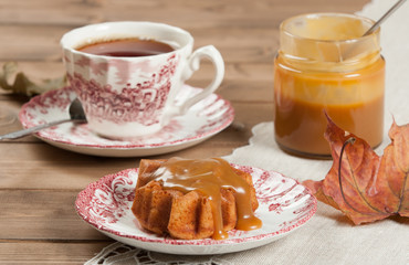 Homebaked Cake, Maple Leaf Shape. Cup Of Tea. Toffee Souce.