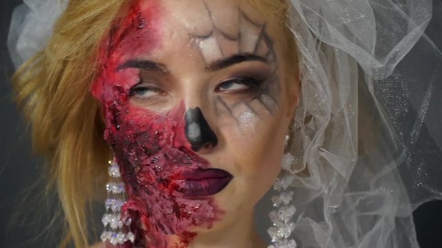 Portrait of a dead bride, made-up blonde image for Halloween looks around