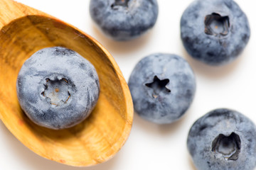 Big ripe blueberries on white background close up