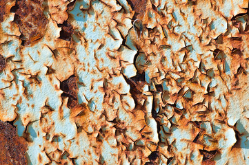 Rusted metallic surface and flaky paint