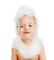 Baby boy with soap foam or shampoo