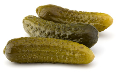 pickled or marinated  cucumbers isolated on white background cut