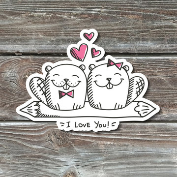 hand drawn beavers in love, paper sticker on realistic wood texture