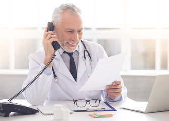 Handsome mature doctor