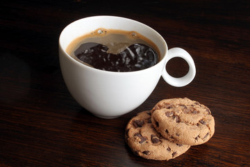 Cup of coffee with cookies
