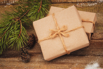 Fototapeta na wymiar Christmas gifts box presents on brown