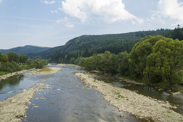 Fototapeta na wymiar Mountain beautiful River in the Carpathians