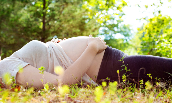 Pregnant woman outside