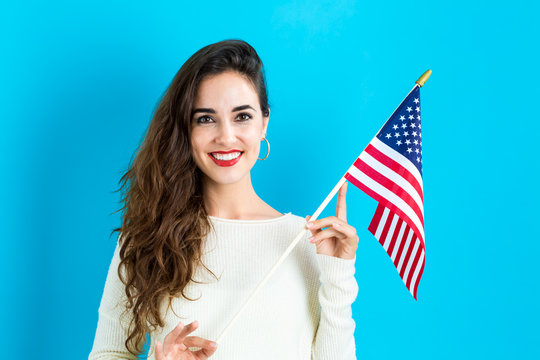 Young Woman Holding American Flag