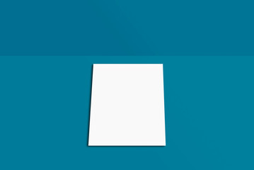 Fototapeta premium White paper card on blue background, for your design and template. Mock-up postcard and cover. White paper card on grey and color background, for your design and template. Three-dimensional rendering
