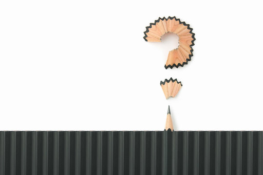 Pencil question mark on background. - Powered by Adobe