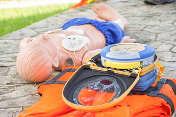 CPR and AED training child dummy drowning case