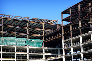 building under construction with iron girders