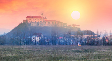 Fototapeta premium Dawn over the castle Palanok
