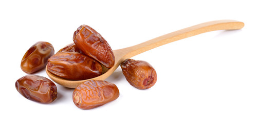 Date with wooden spoon isolated on white background