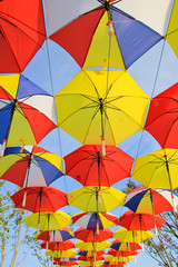 Fototapeta na wymiar colorful umbrella on the sky / A view of colorful umbrella on the sky