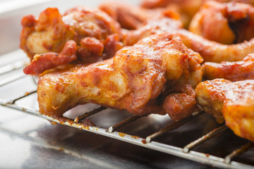 Roasted chicken wings with spicy sauce