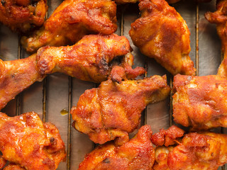 Roasted chicken wings with spicy sauce