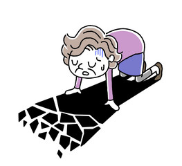 絶望して落ち込むシニア女性

