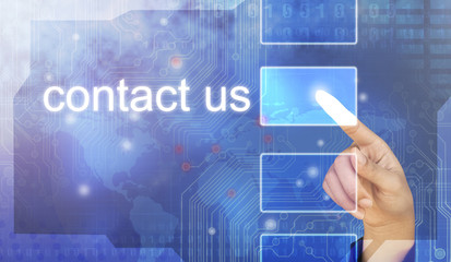 businessman hand pushing contact us button