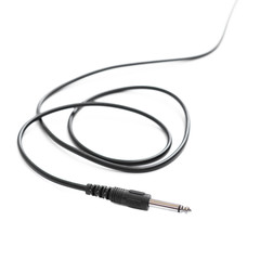 Guitar audio jack with black cable isolated on white background.