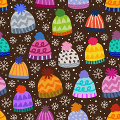 seamless winter pattern with caps and snowflakes