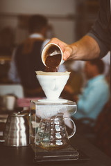 Coffeemaker pouring grind coffee filter