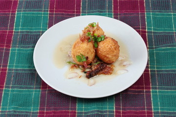 Fried hard-boiled eggs with tamarind sauce call as Khai Luk Keoi in Thai ,which mean egg gift  from son-in-law , is tasty as sweet sour and little spicy topped crispy skin of boiled egg. 