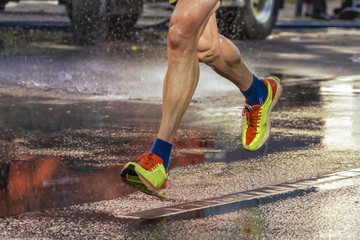 Street runner runs on wet street