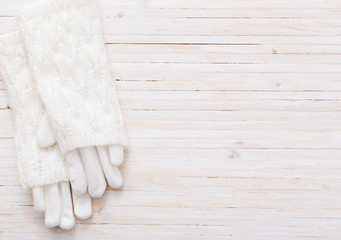 gloves on white wooden background