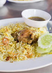 Rice with curried chicken biryani with sauce sweet and sour