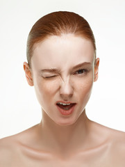 Emotional beauty portraits red-haired girl.