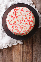 beautiful red velvet cake close up on the table. vertical top view