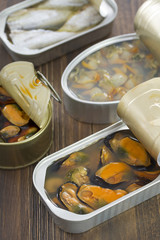 seafood in iron box on wooden background