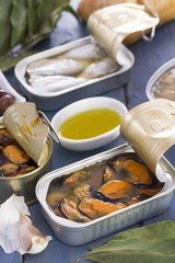 seafood in iron box on wooden background