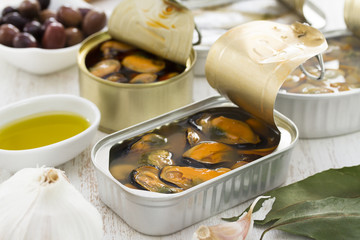 seafood in iron box on wooden background