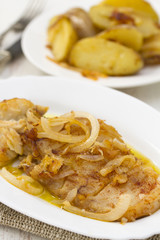 cod fish with potato on white dish