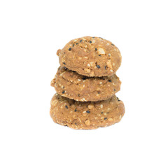 Oatmeal cookies with nuts and sesame seeds isolated on white bac