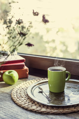 Reading books with coffee wooden background