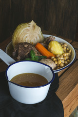 madrileno cooked, chickpea and meat stew, typical spanish cuisin