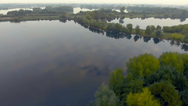 Nature sanctuary. Misty lakes in the morning. Aerial view