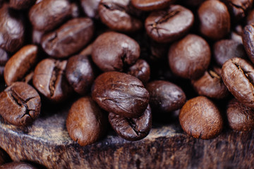 Naklejka premium Coffee Bean on wood background with filter effect retro vintage