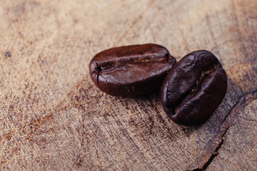 Coffee Bean on wood background with filter effect retro vintage