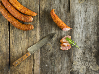 Delicious sausages on the table