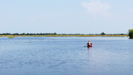 Fototapeta na wymiar Boating lake flooded rice fields.