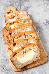 Sliced banana bread with cream cheese