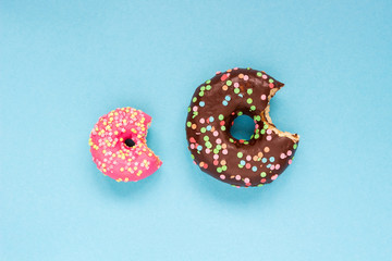 Sweet donuts on the blue background.